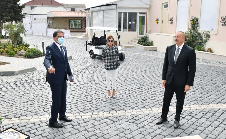 President Ilham Aliyev and first lady Mehriban Aliyeva viewed landscaping work carried out in Balakhani settlement