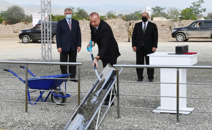 President Ilham Aliyev laid foundation stone for first residential building to be built in Aghdam city