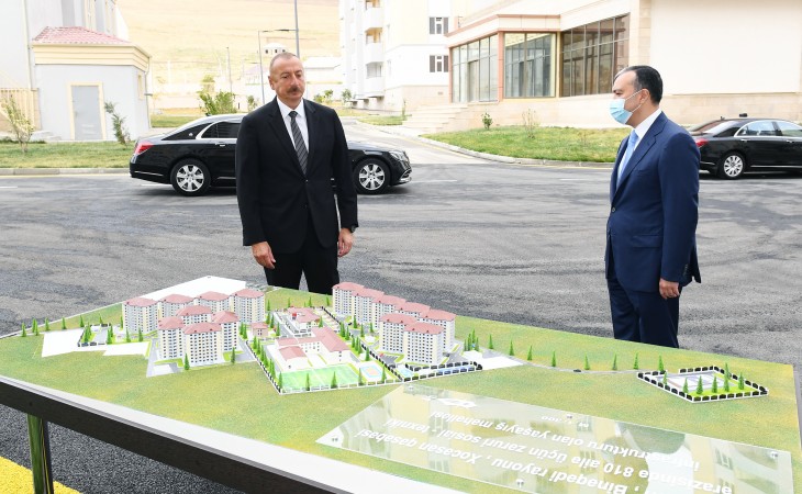 President Ilham Aliyev attended ceremony to give out apartments and cars to families of martyrs and war disabled in Khojasan settlement