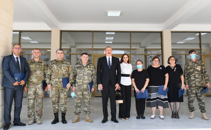 Families of martyrs, war disabled and heroes of Patriotic War were presented with apartments and cars President Ilham Aliyev and First Lady Mehriban Aliyeva attended the ceremony